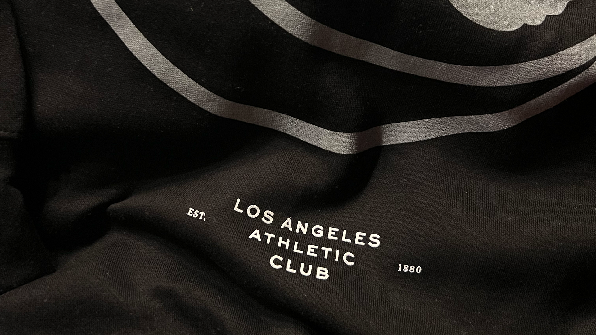Black Grey Hoodie Logo Closeup